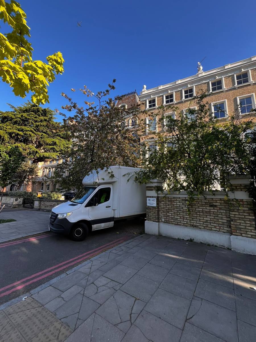 A Fastiya Logistics removals van on Clapham Common Northside